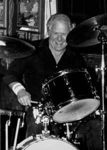Pete behind drums smiling